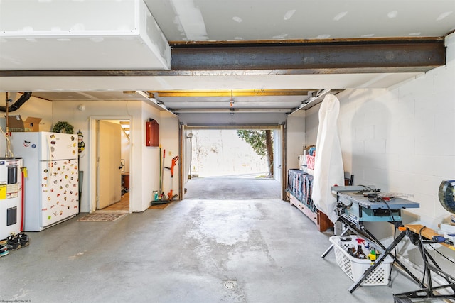 garage with white fridge