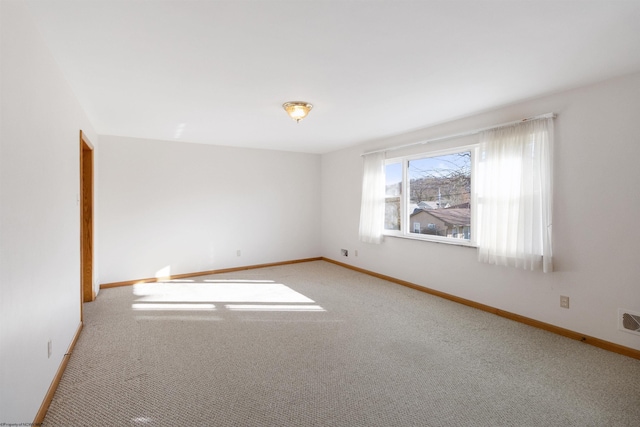 empty room featuring carpet floors