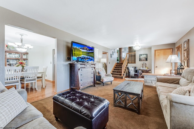 living room featuring hardwood / wood-style floors and a chandelier