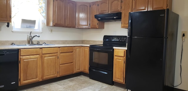 kitchen featuring sink and black appliances