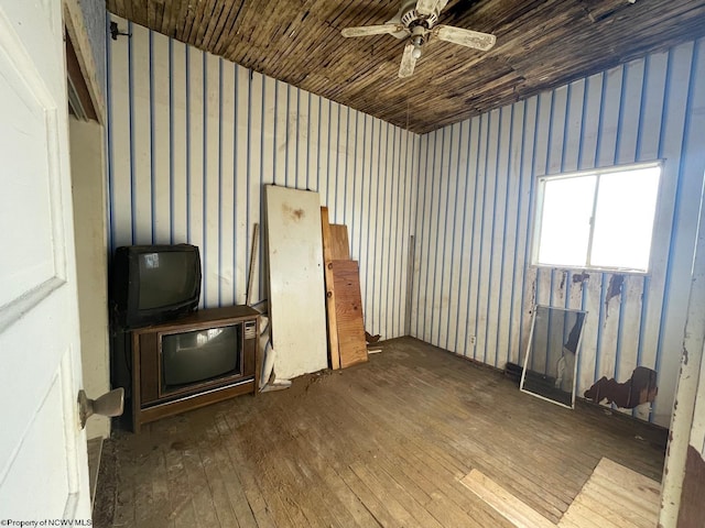 misc room with hardwood / wood-style flooring and ceiling fan