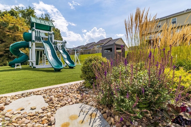 view of play area featuring a lawn