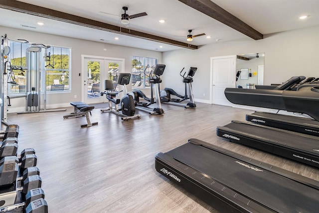 gym featuring ceiling fan, hardwood / wood-style floors, and french doors