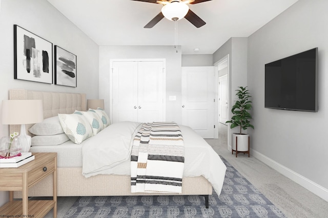 carpeted bedroom featuring a closet and ceiling fan