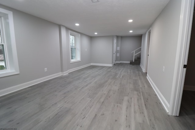 interior space featuring a wealth of natural light and light hardwood / wood-style flooring