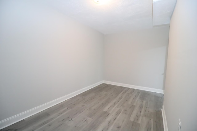 empty room featuring light hardwood / wood-style floors