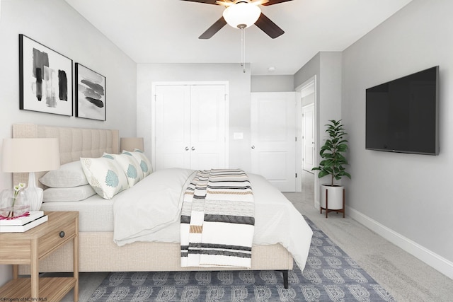 carpeted bedroom with ceiling fan and a closet