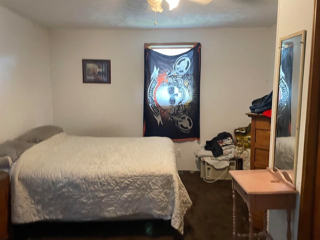 bedroom featuring carpet and ceiling fan