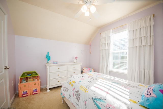 carpeted bedroom featuring ceiling fan and lofted ceiling