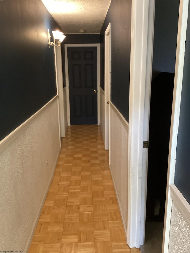 hall featuring light parquet flooring