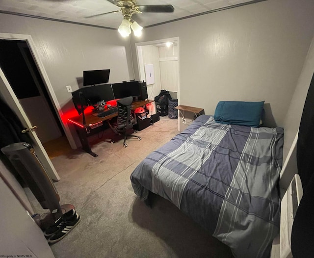 bedroom featuring ceiling fan and carpet floors