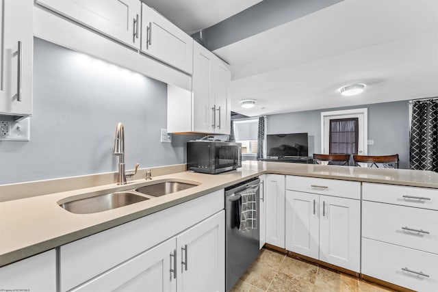 kitchen with white cabinetry, sink, and appliances with stainless steel finishes