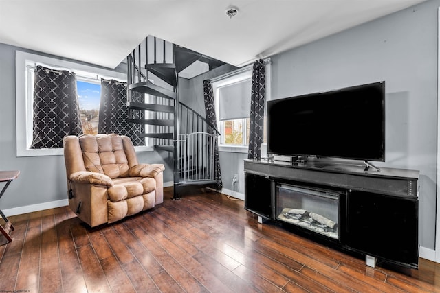 sitting room featuring hardwood / wood-style flooring and plenty of natural light