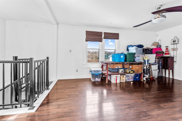 interior space with ceiling fan