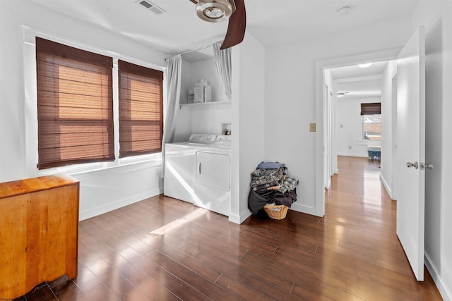 interior space featuring separate washer and dryer and dark hardwood / wood-style floors