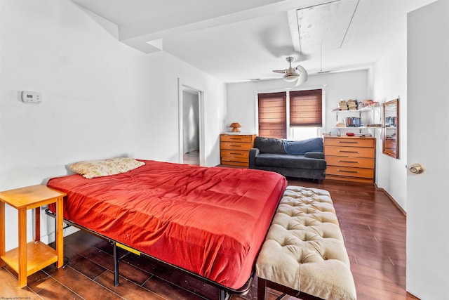 bedroom with ceiling fan and dark hardwood / wood-style flooring