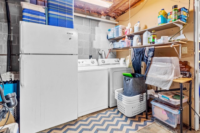 laundry room with washer and dryer