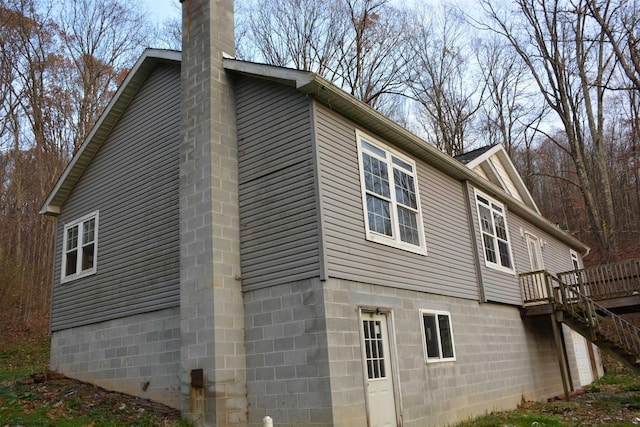 view of home's exterior with a deck