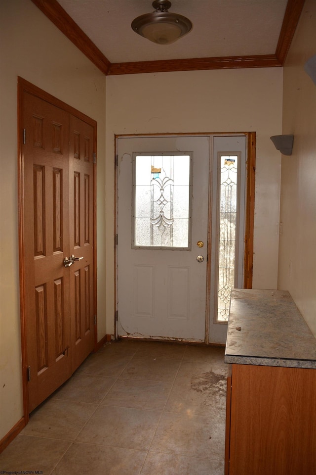 entrance foyer featuring ornamental molding