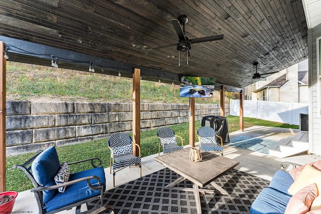 view of patio featuring ceiling fan