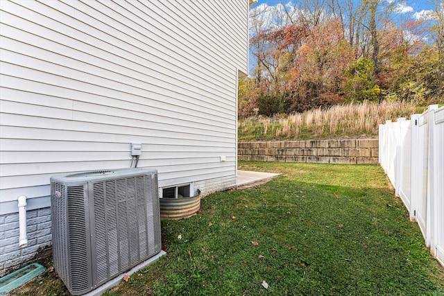 view of yard with central AC unit