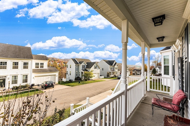 balcony featuring covered porch