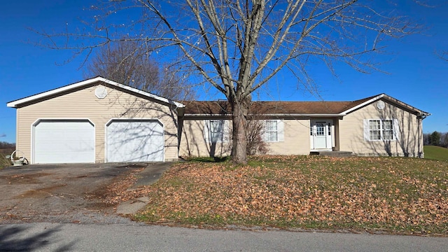 single story home with a garage