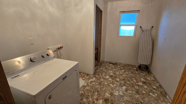 washroom with washer / clothes dryer