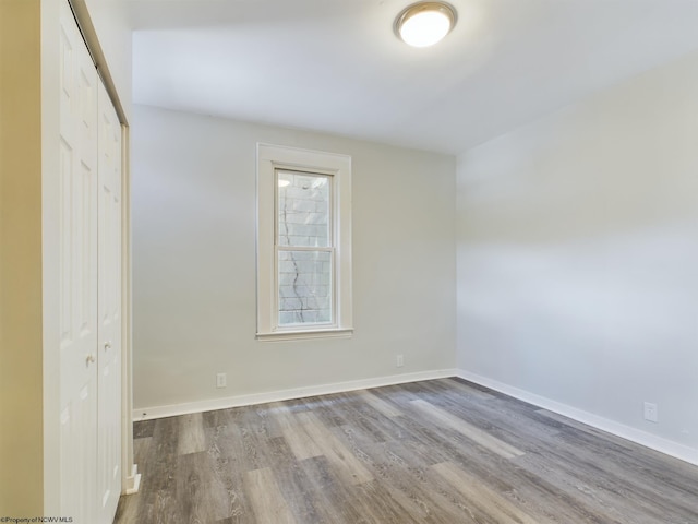 interior space featuring hardwood / wood-style floors and a closet