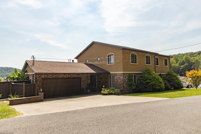 view of front of house with a garage