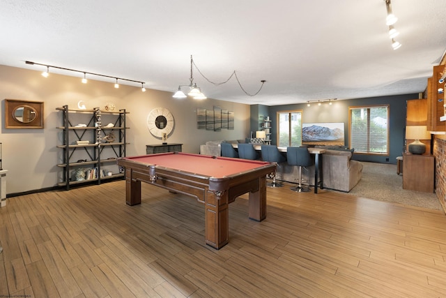 playroom featuring track lighting, light hardwood / wood-style floors, and billiards