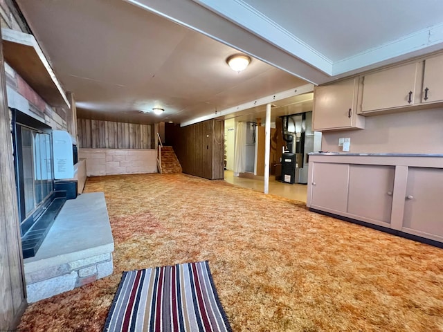 kitchen with heating unit and light carpet