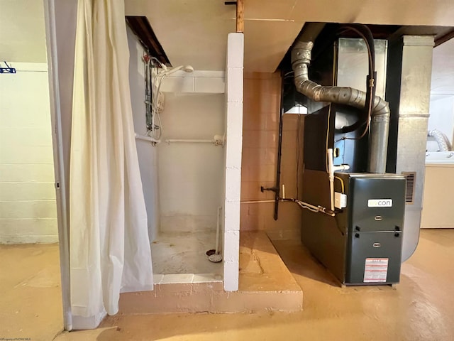 utility room featuring washer / dryer