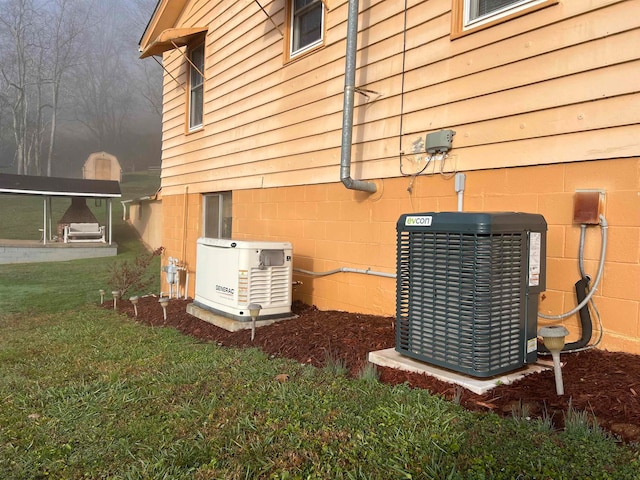 view of property exterior featuring central air condition unit, a lawn, and a carport