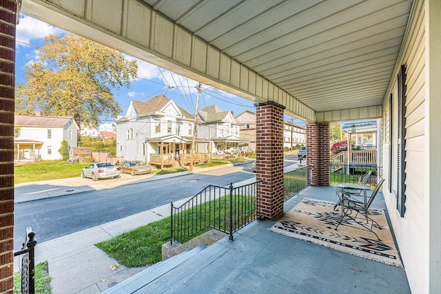 view of patio featuring a porch