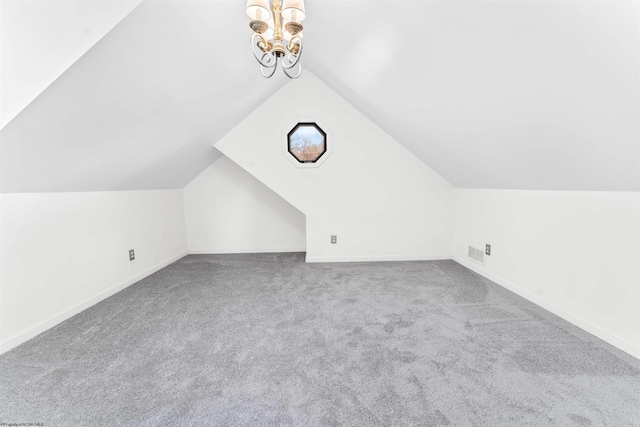 bonus room featuring carpet flooring and lofted ceiling