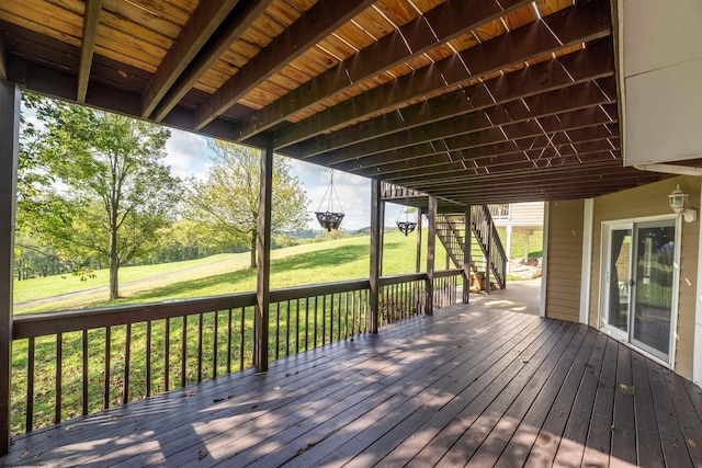 deck featuring a lawn