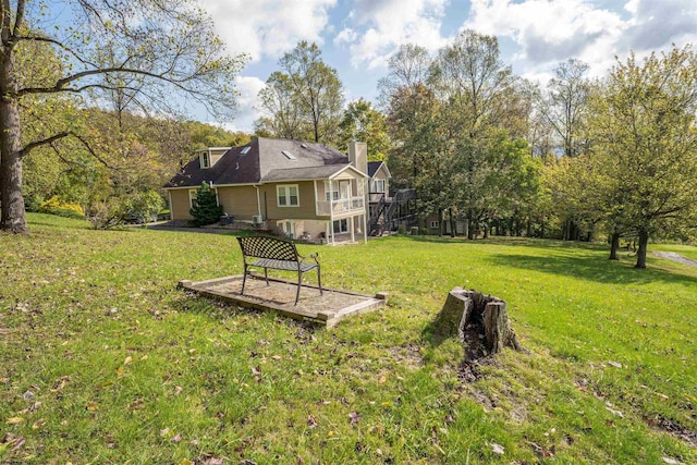 view of yard with a deck