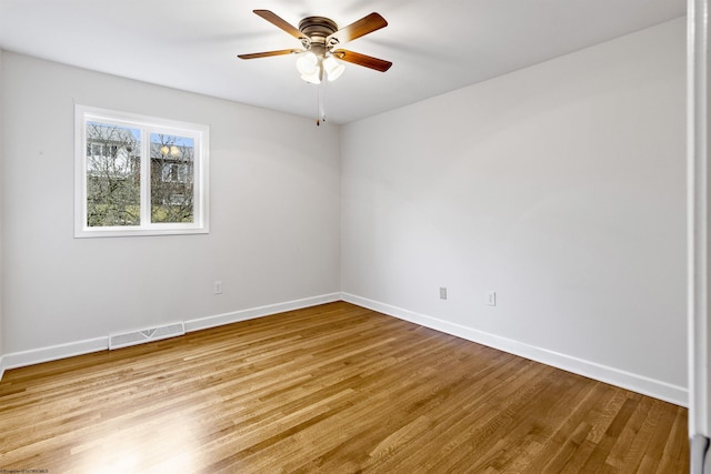 unfurnished room featuring ceiling fan and light hardwood / wood-style flooring