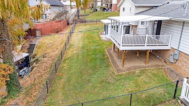 view of yard with a deck