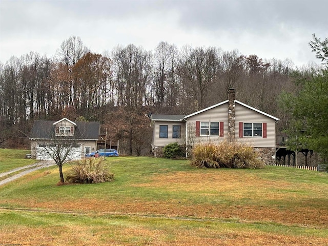 view of front of home with a front lawn