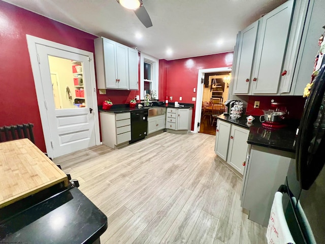 kitchen featuring dishwasher, refrigerator, ceiling fan, and light hardwood / wood-style flooring