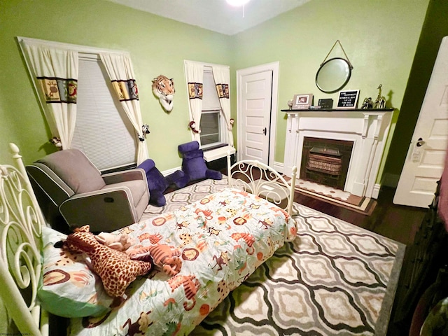 bedroom featuring hardwood / wood-style flooring