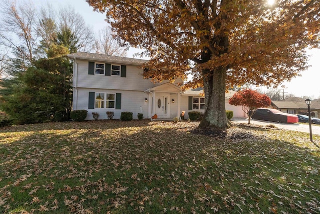 view of front of property with a front lawn