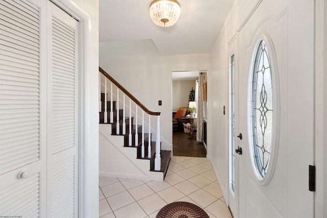 view of tiled foyer entrance