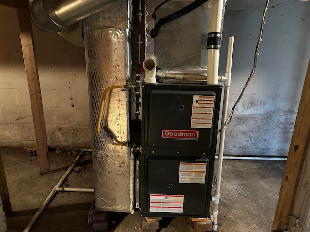 utility room with heating unit