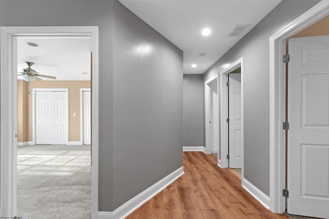 hallway featuring light wood-type flooring