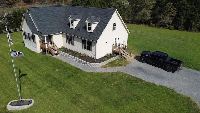 view of front of home with a front yard