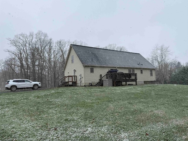 view of side of home featuring a yard