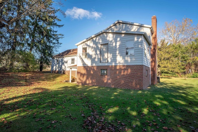 1053 Takoma St, Morgantown, WV 26505 - view of property exterior featuring a chimney, a lawn, and brick siding